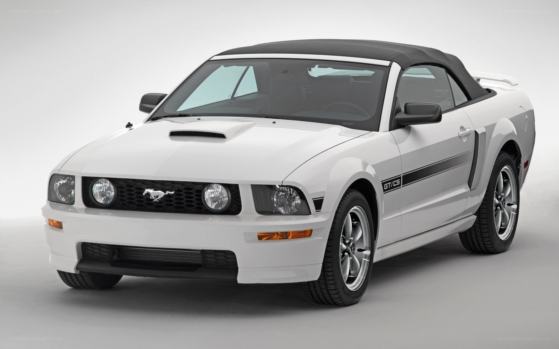 white mustang convertible