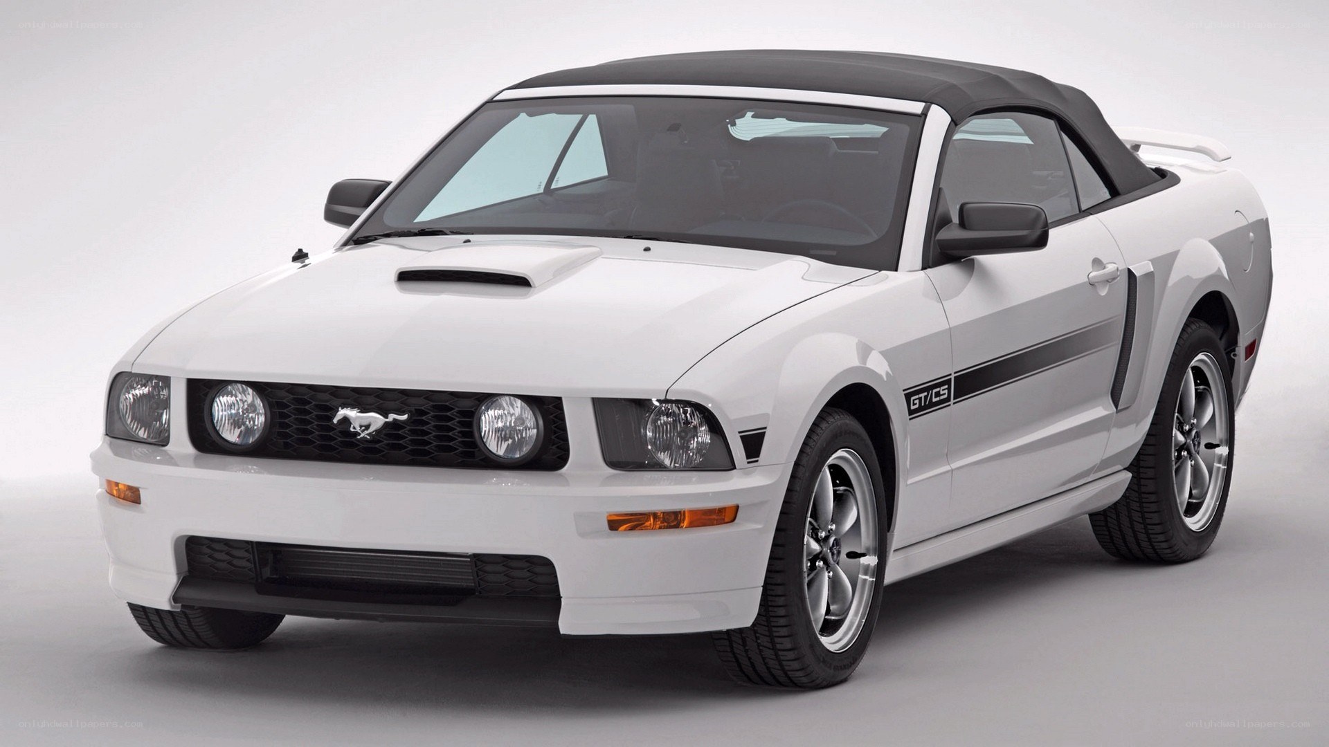white mustang convertible