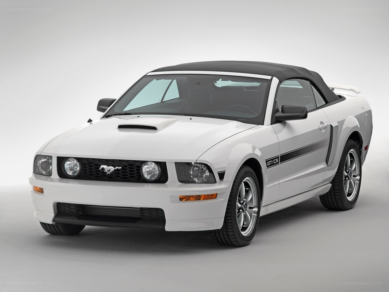 white mustang convertible