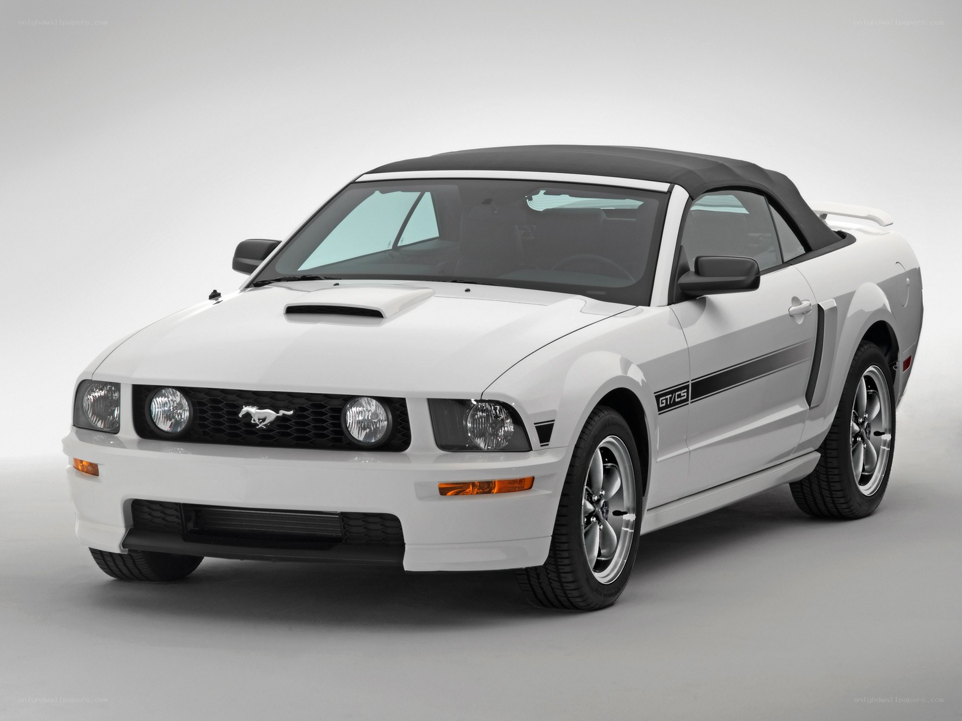 white mustang convertible