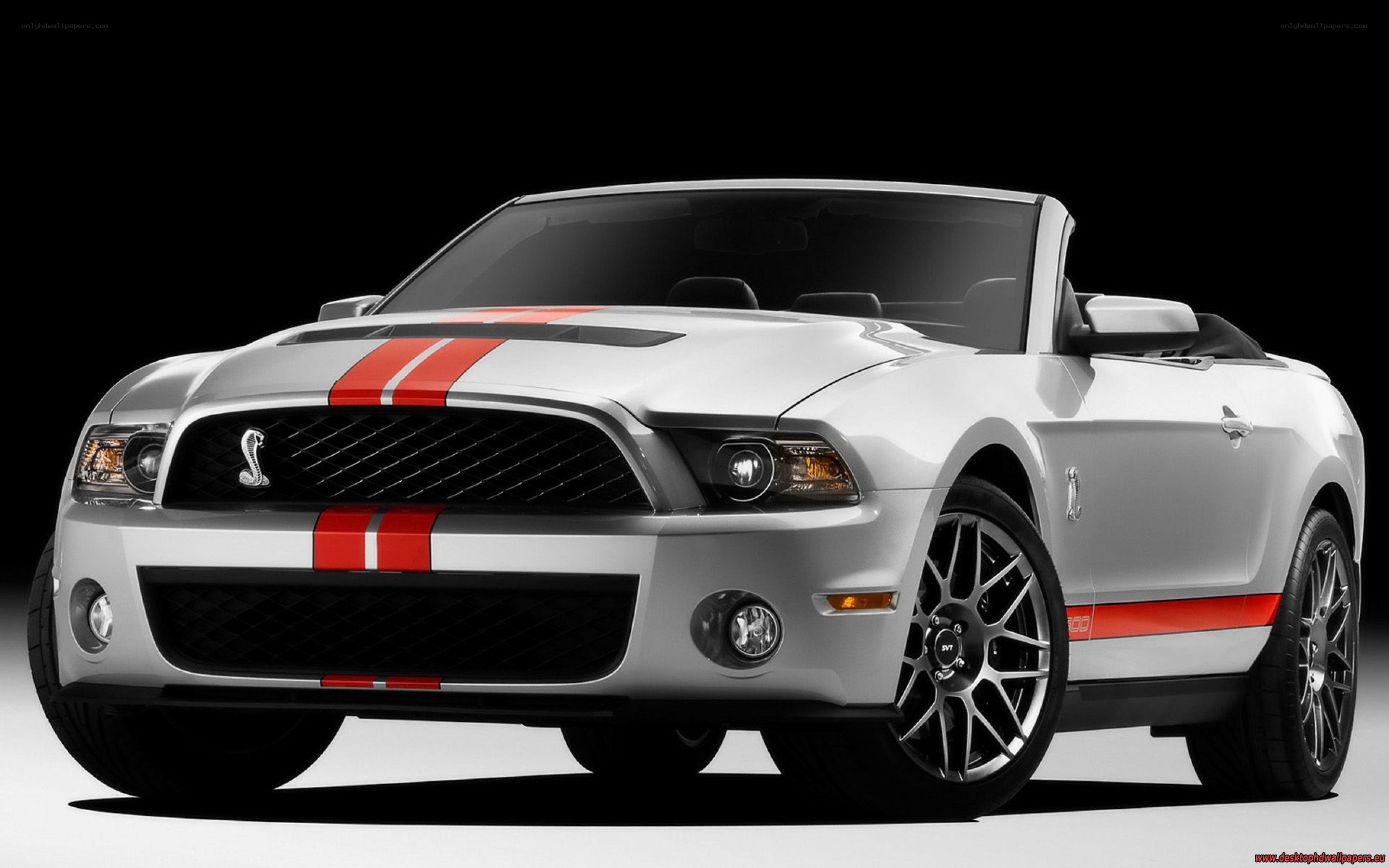 white mustang convertible with red stripes