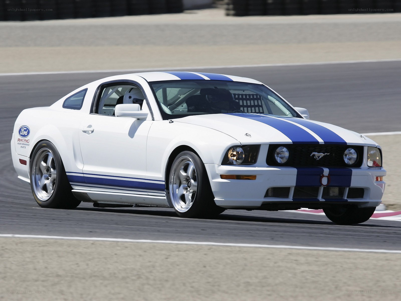 white mustang on racetrack