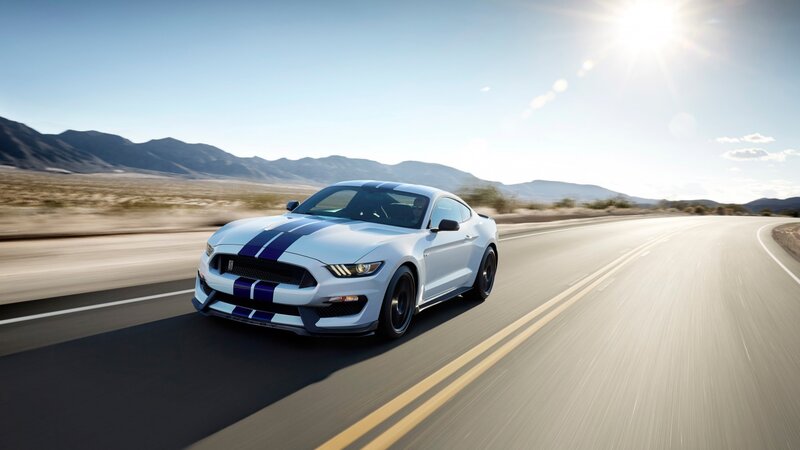 White Mustang on Road — Dynamic