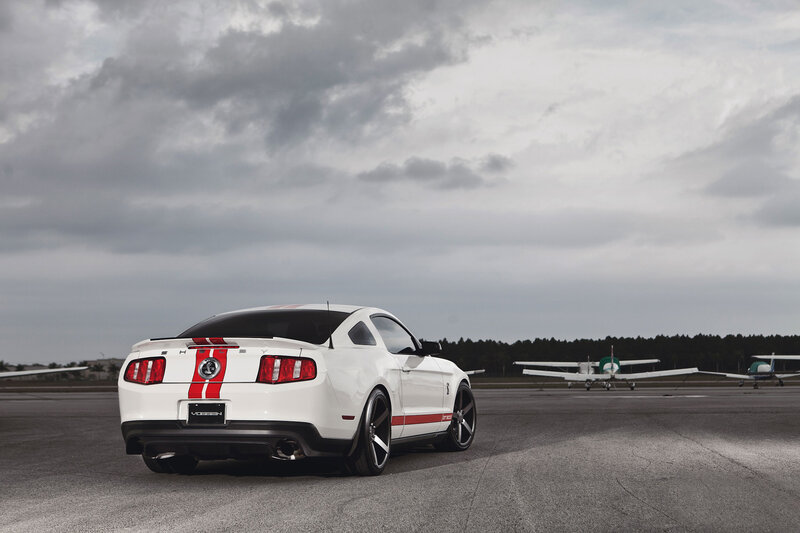 White Mustang on Tarmac — Dramatic, Photograph