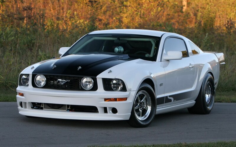 white mustang with black hood