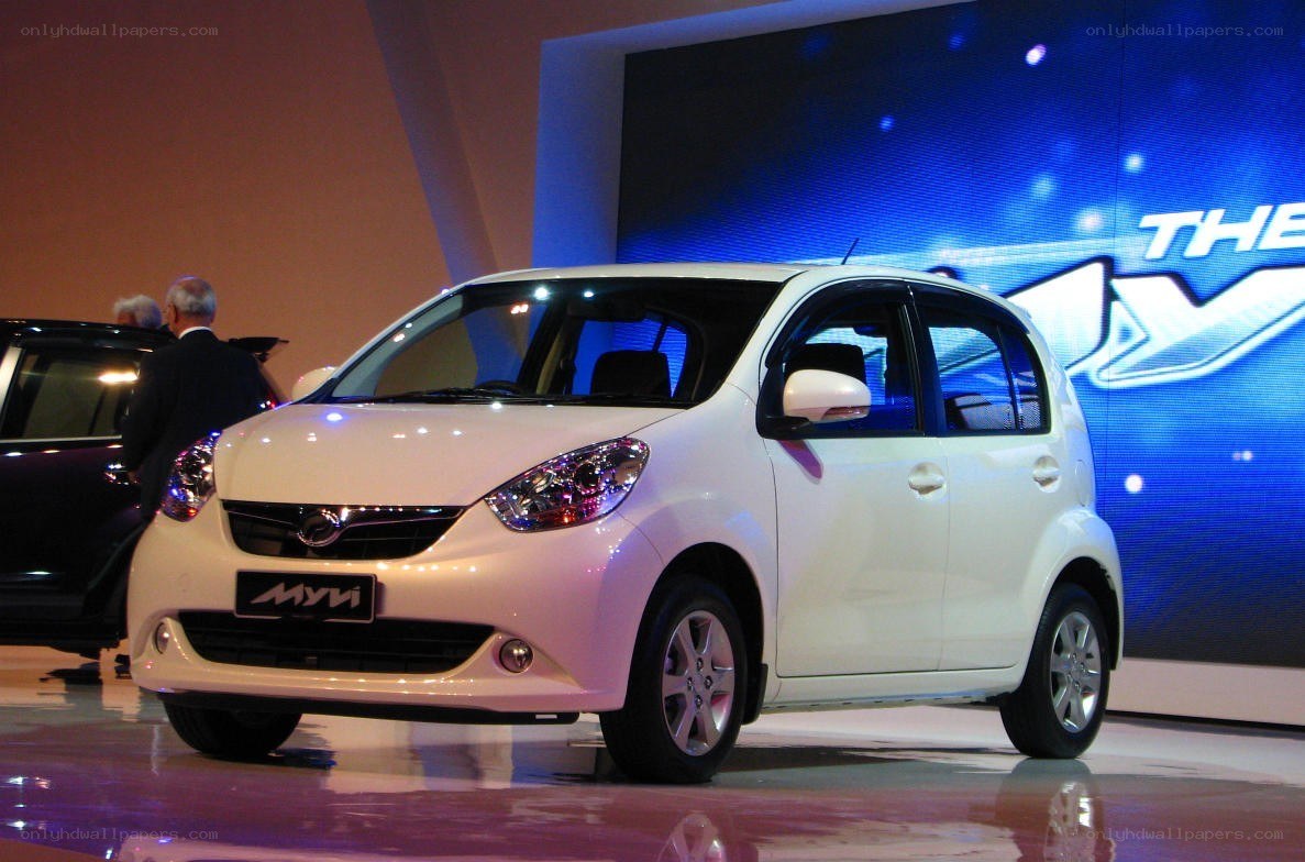 White Myvi car on display