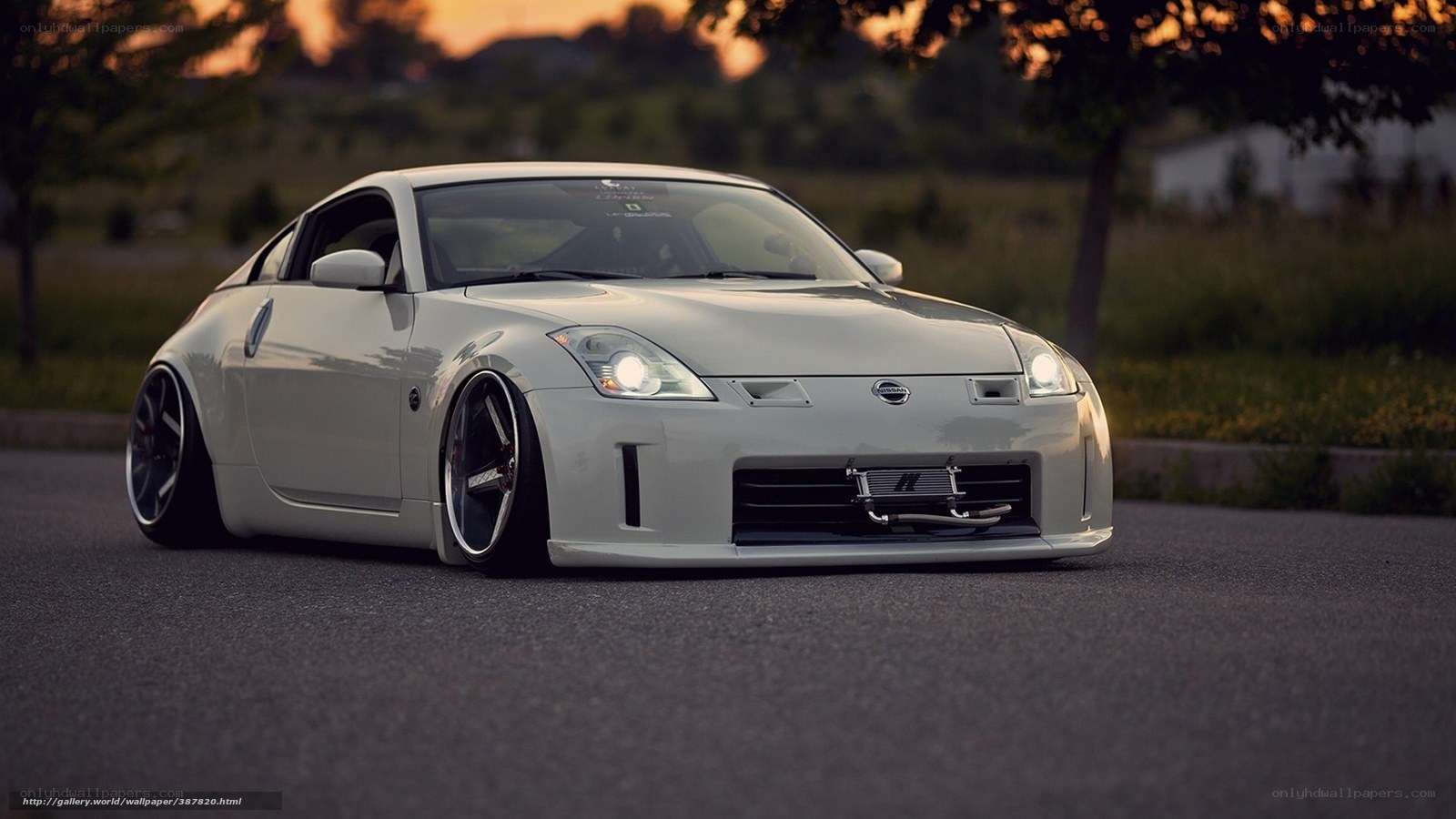 white nissan 350z at sunset