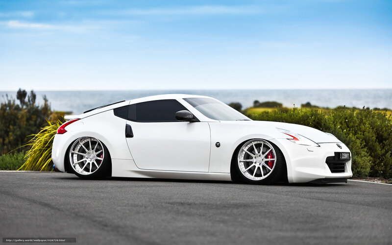 White Nissan 370Z by the coast