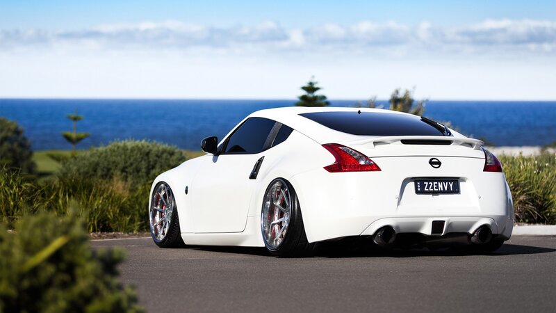 White Nissan 370Z by the ocean