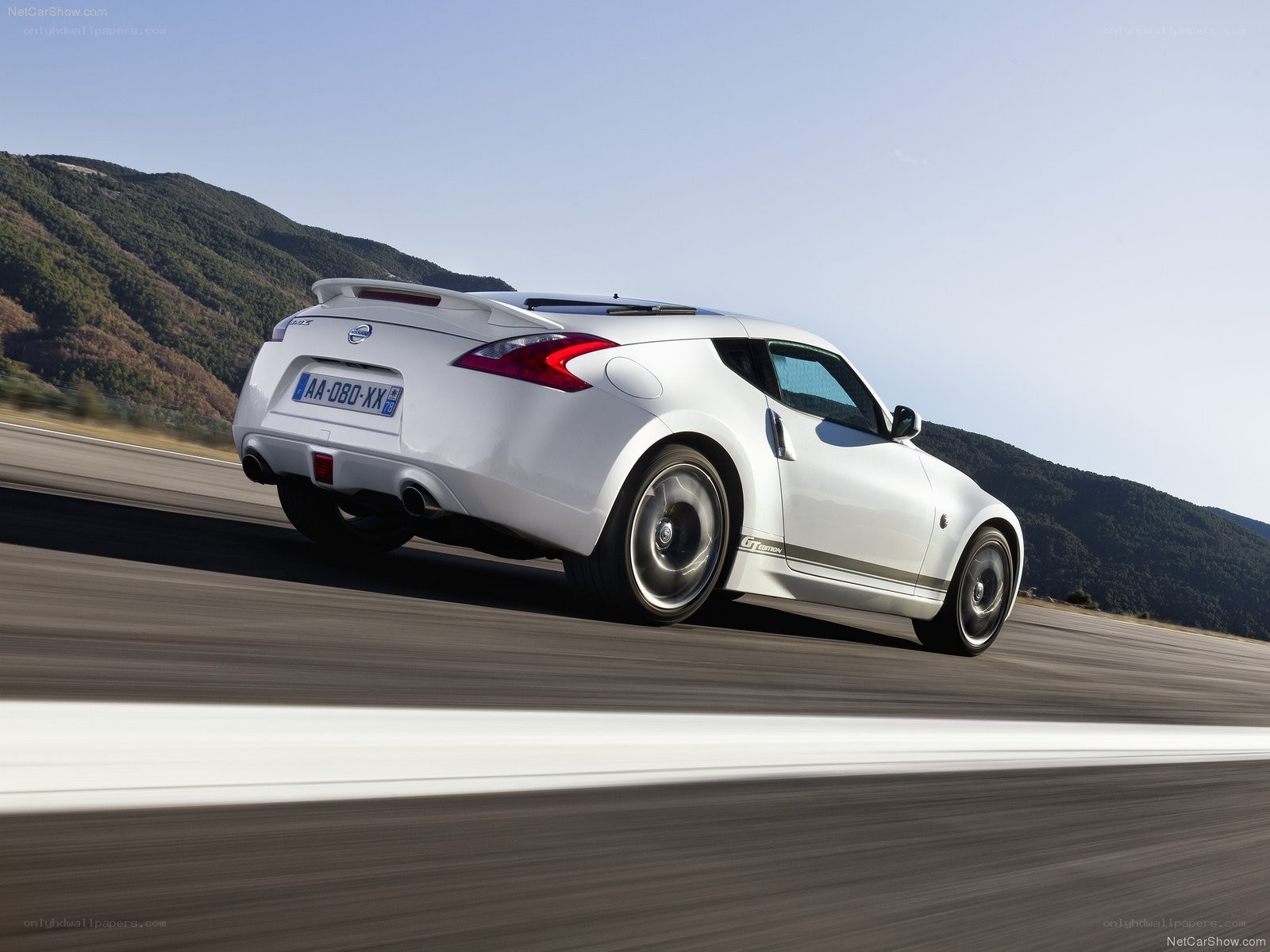 White Nissan 370Z in motion