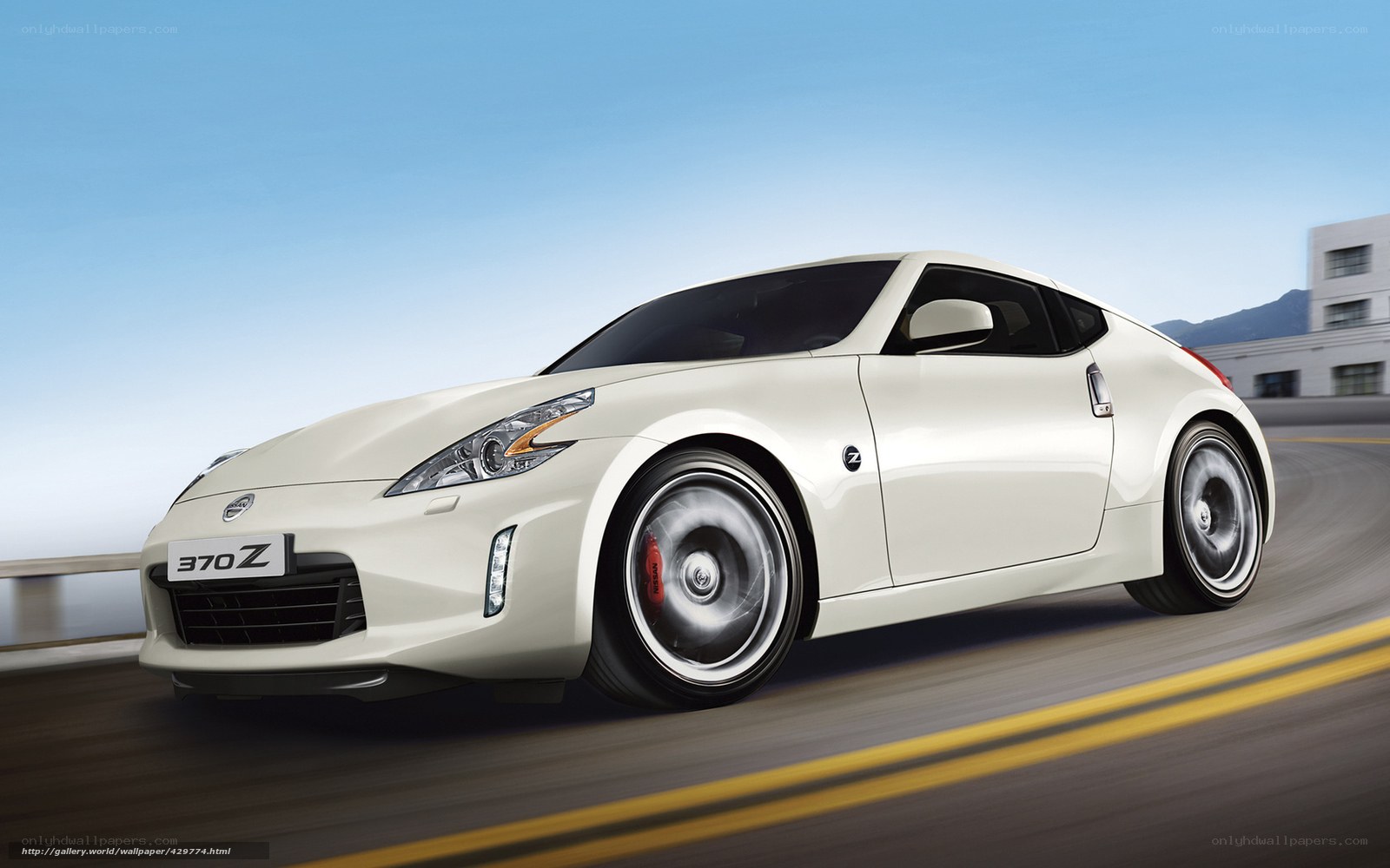 White Nissan 370Z in motion