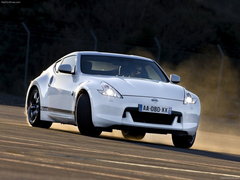White Nissan 370Z on a racetrack