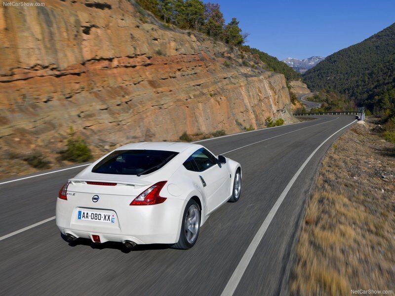 White Nissan 370Z on mountain road