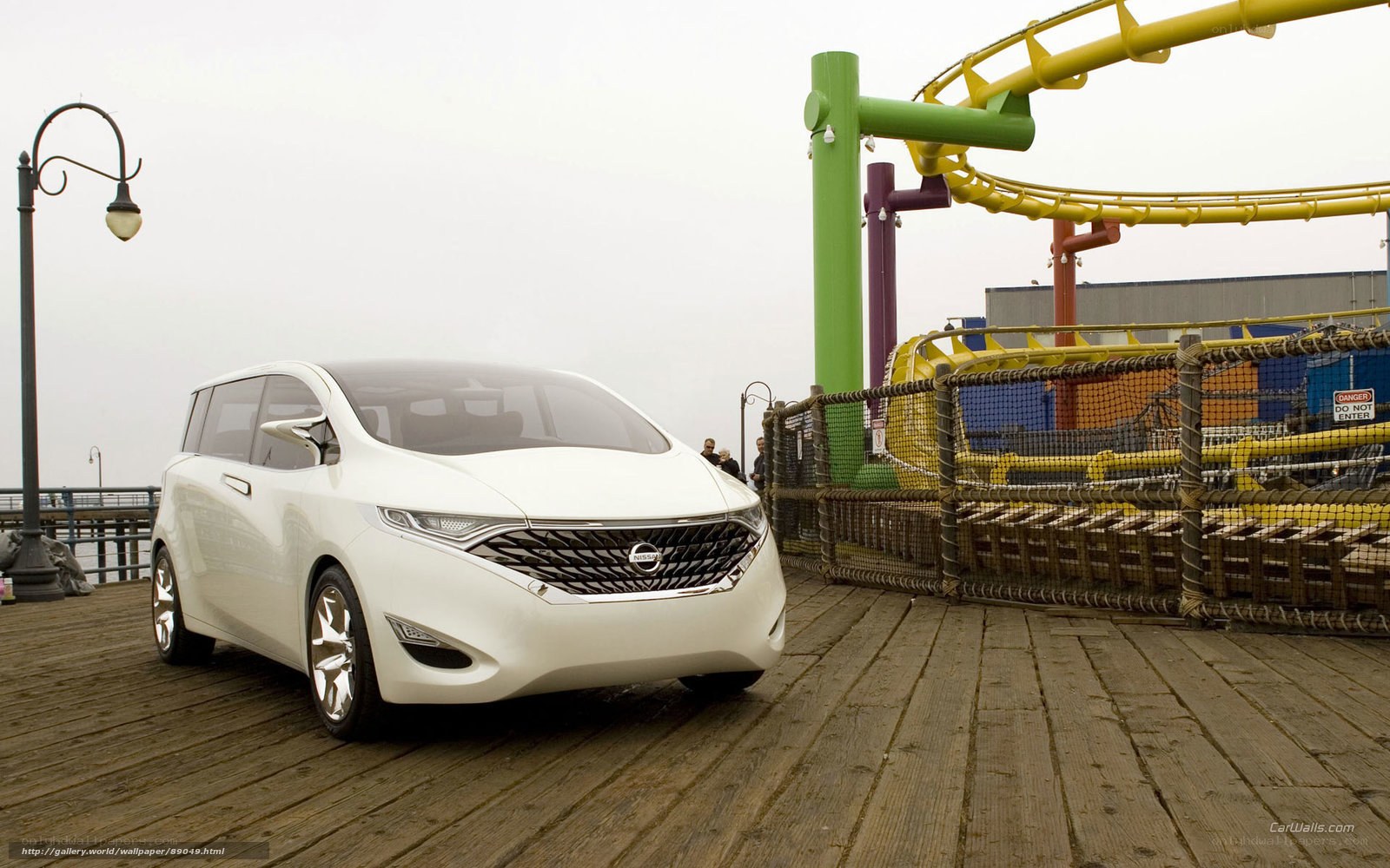 White Nissan concept car on pier