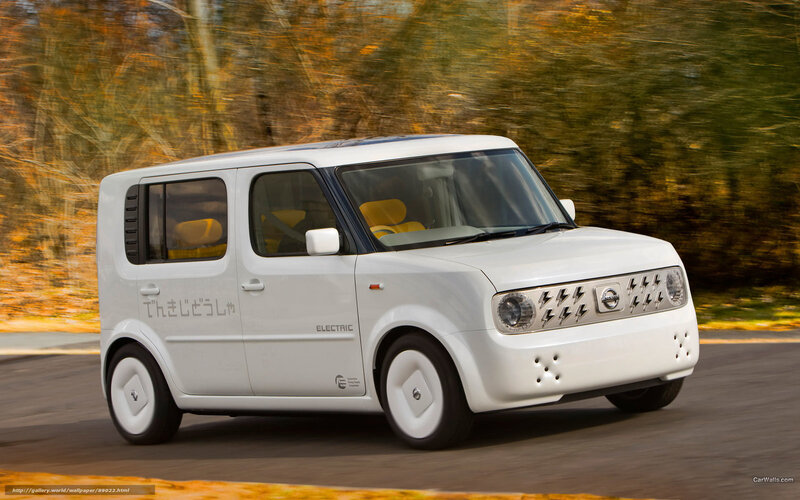White Nissan Cube Electric in motion