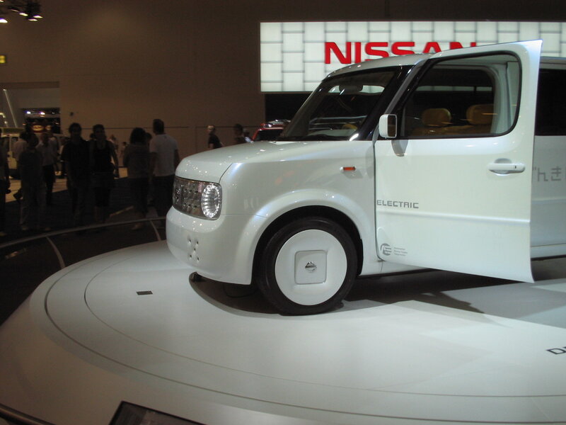 White Nissan electric car on display