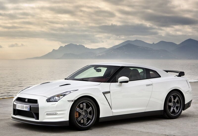 White Nissan GT-R by the sea