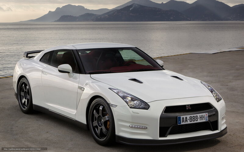 White Nissan GT-R by the sea