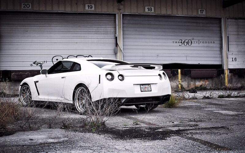 White Nissan GT-R in industrial lot