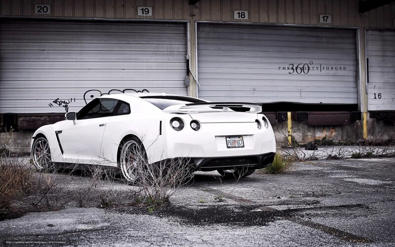White Nissan GT-R in industrial lot