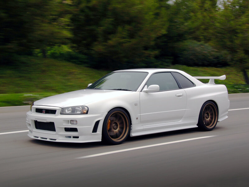 White Nissan GT-R in motion
