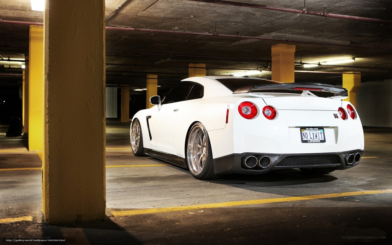 White Nissan GT-R in parking garage