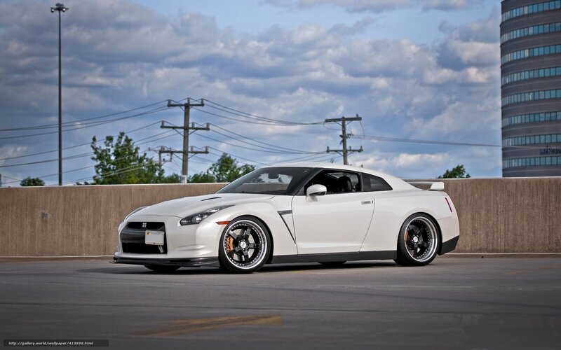 White Nissan GT-R on a city overpass