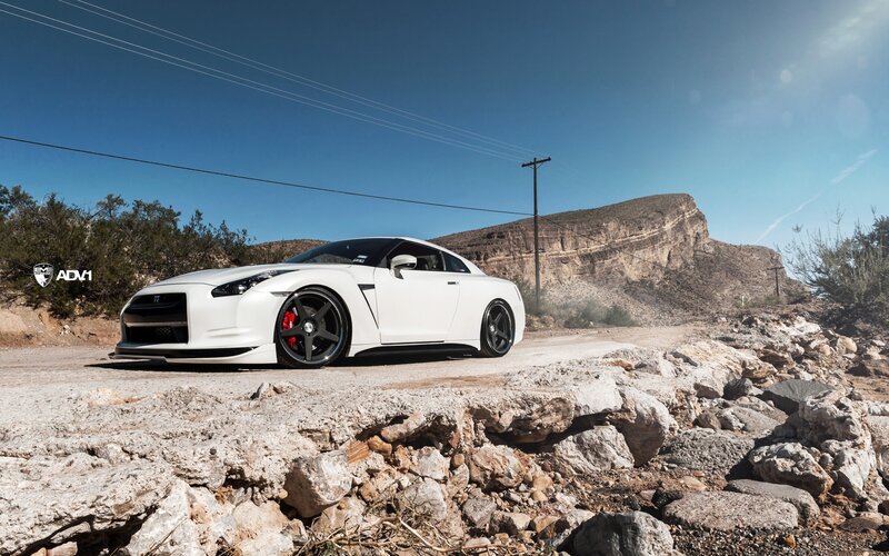 White Nissan GT-R on a desert road