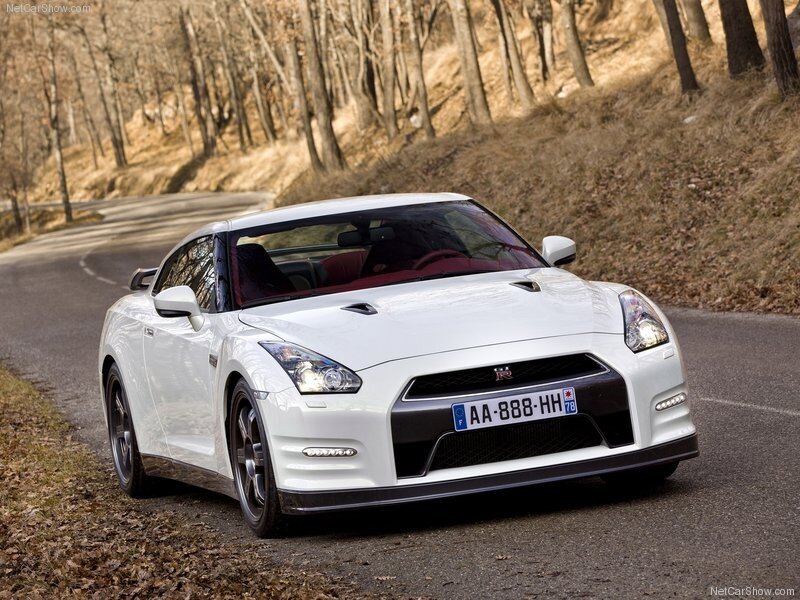 White Nissan GT-R on a forest road