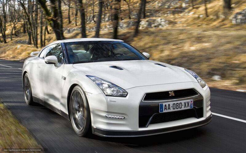White Nissan GT-R on a forest road