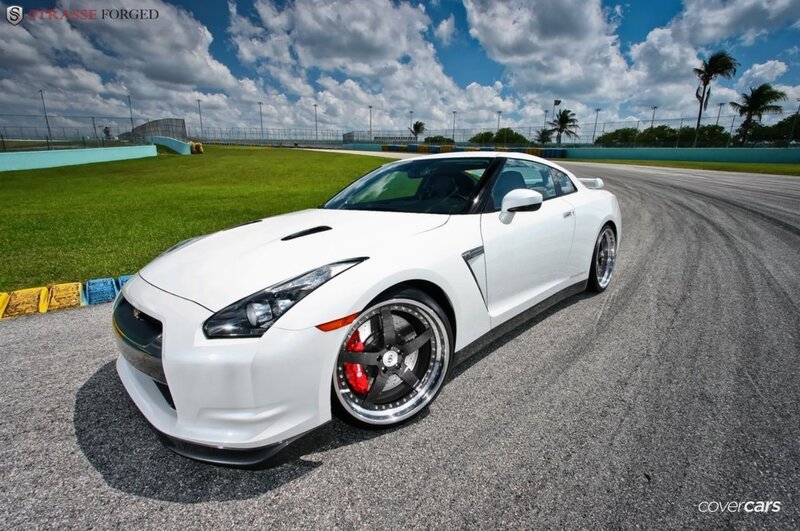 White Nissan GT-R on a racetrack