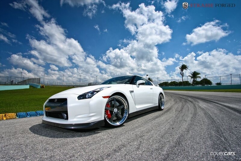 White Nissan GT-R on a racetrack