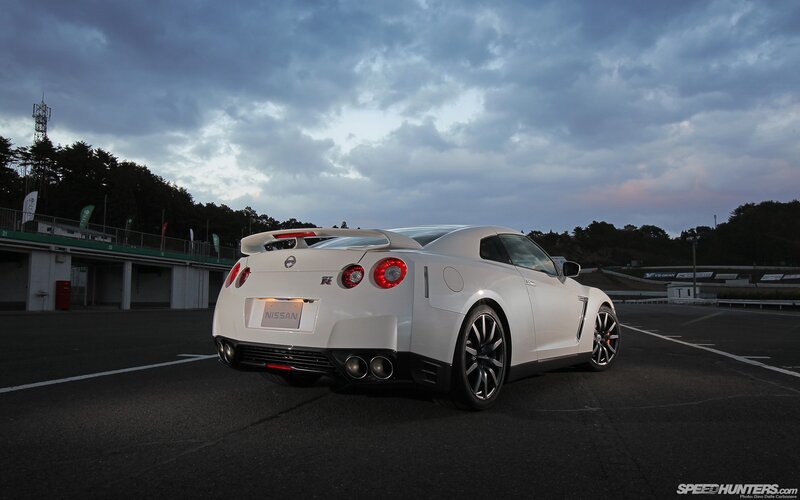 White Nissan GT-R on a racetrack