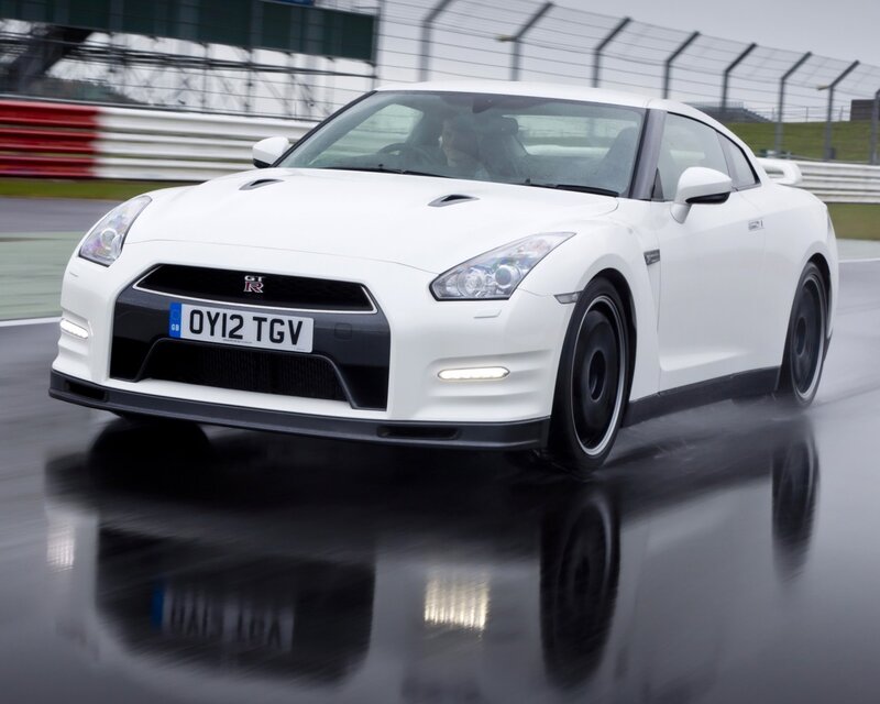 White Nissan GT-R on a racetrack
