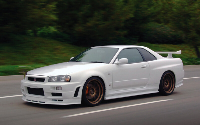 White Nissan GT-R on a road