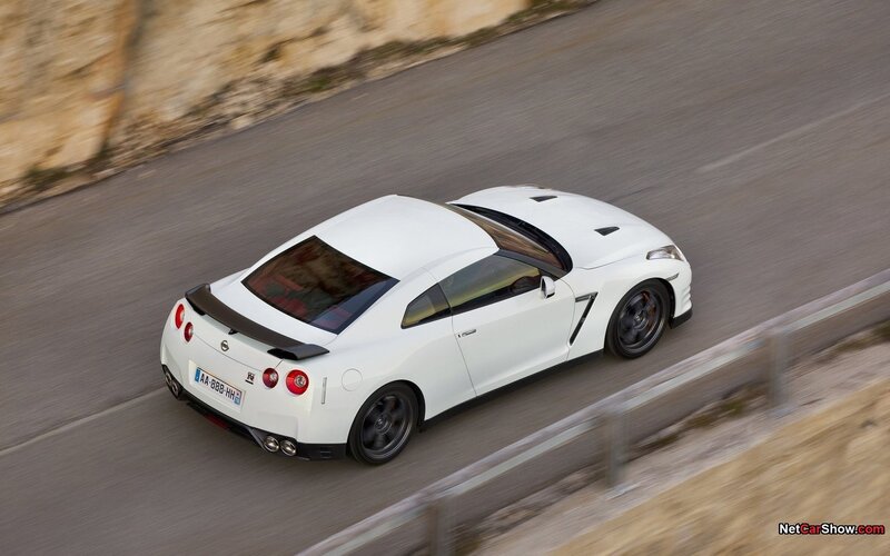 white nissan gt-r on a road