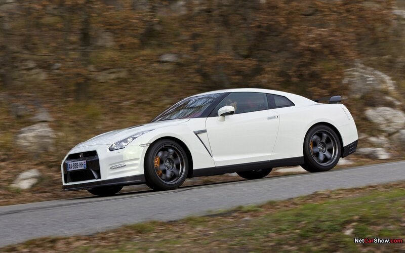 white nissan gt-r on a road