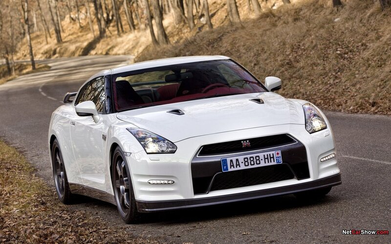 White Nissan GT-R on a winding road