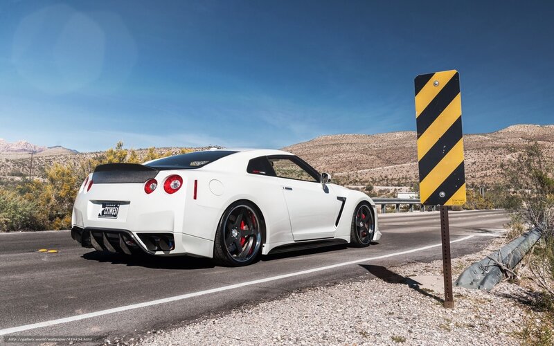 White Nissan GT-R on desert road