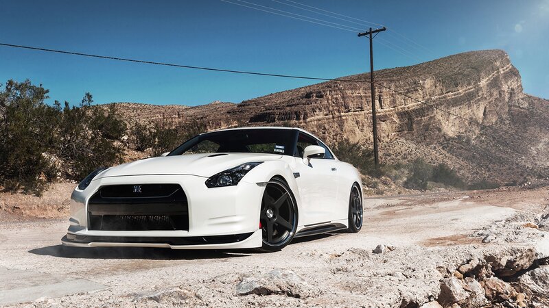 White Nissan GT-R on desert road