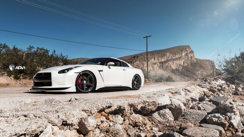 White Nissan GT-R on desert road