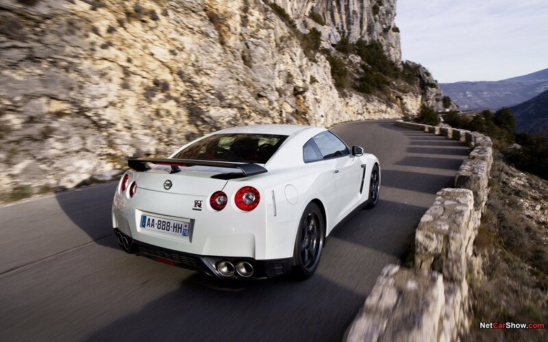 white nissan gt-r on mountain road
