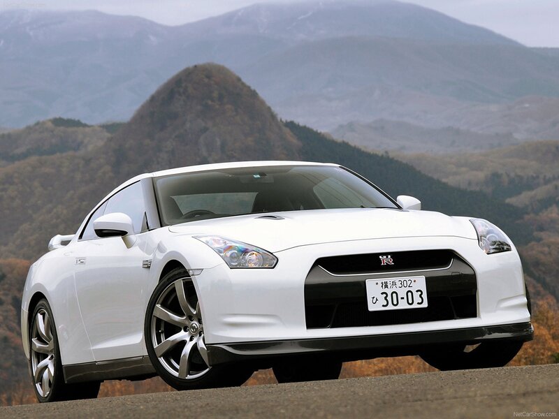 White Nissan GT-R on mountain road