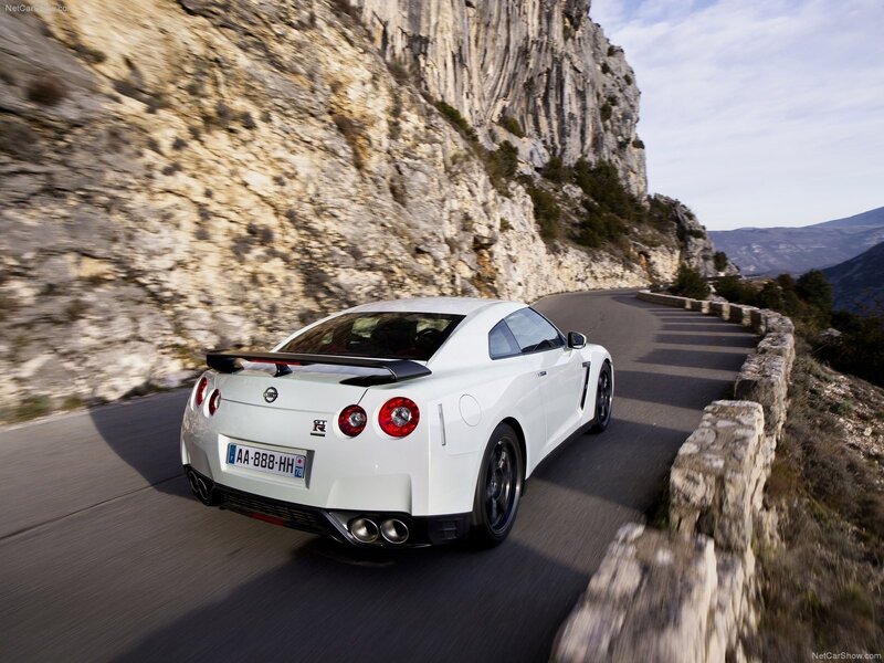 White Nissan GT-R on mountain road