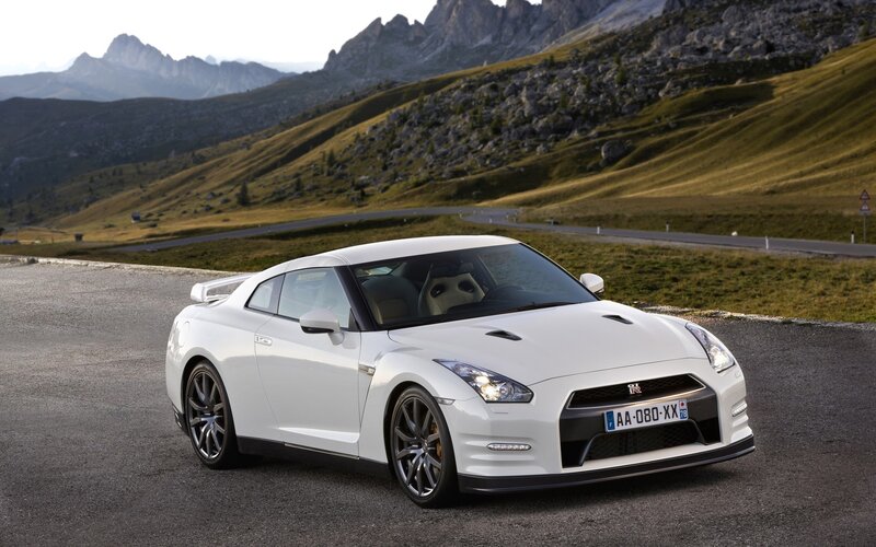 White Nissan GT-R on mountain road