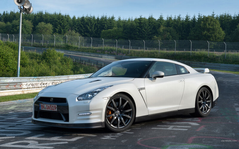 White Nissan GT-R on racetrack