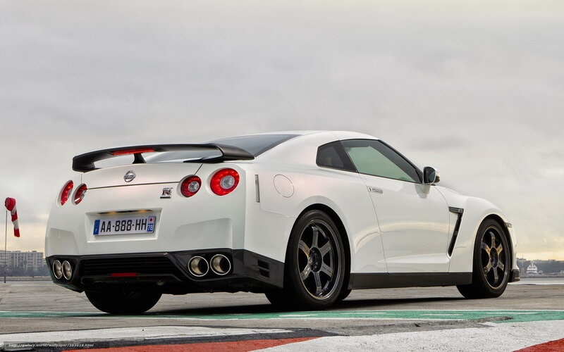 White Nissan GT-R on racetrack