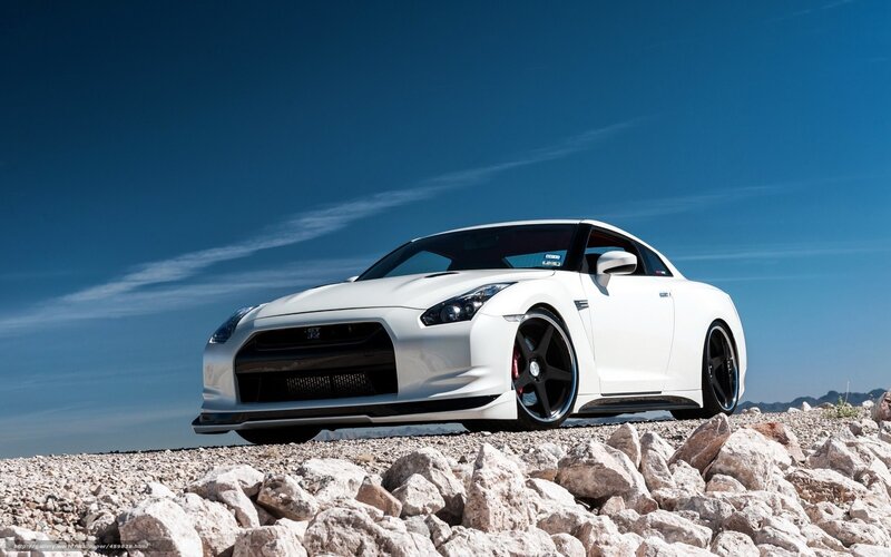 White Nissan GT-R on rocky terrain