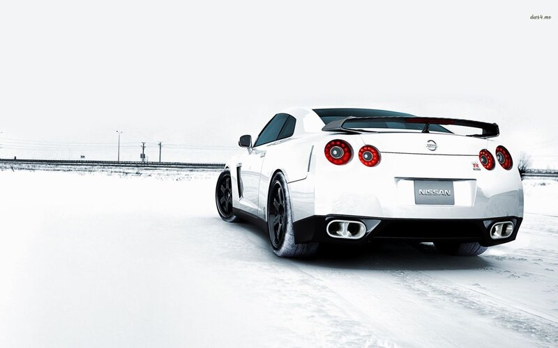 white nissan gt-r on snow