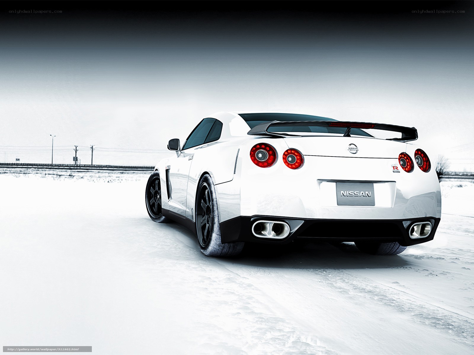 White Nissan GT-R on snowy road